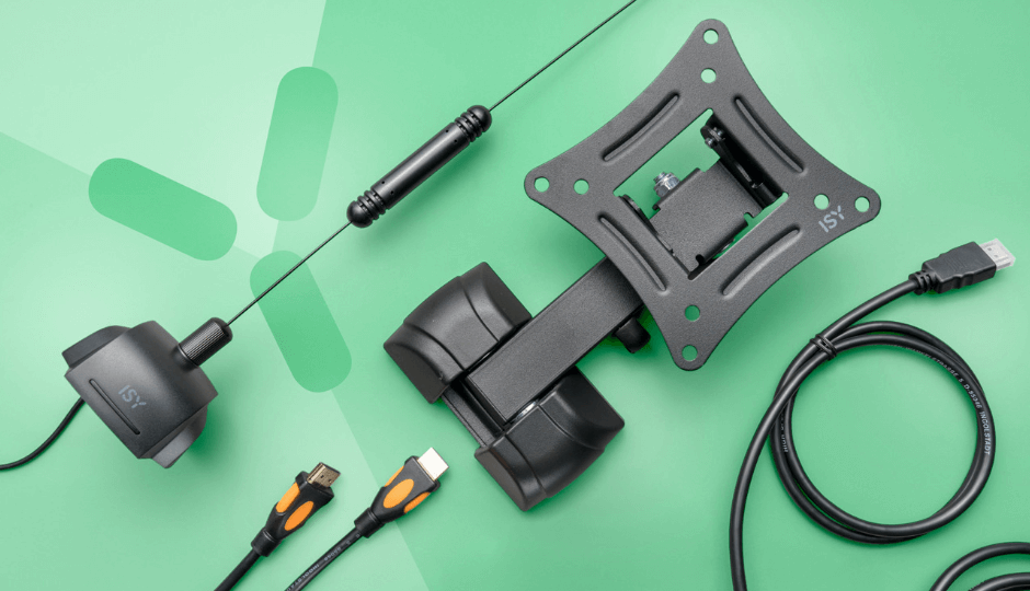 The top view of a TV wall mount, surrounded by HDMI cables and chargers, all products made by ISY, green background